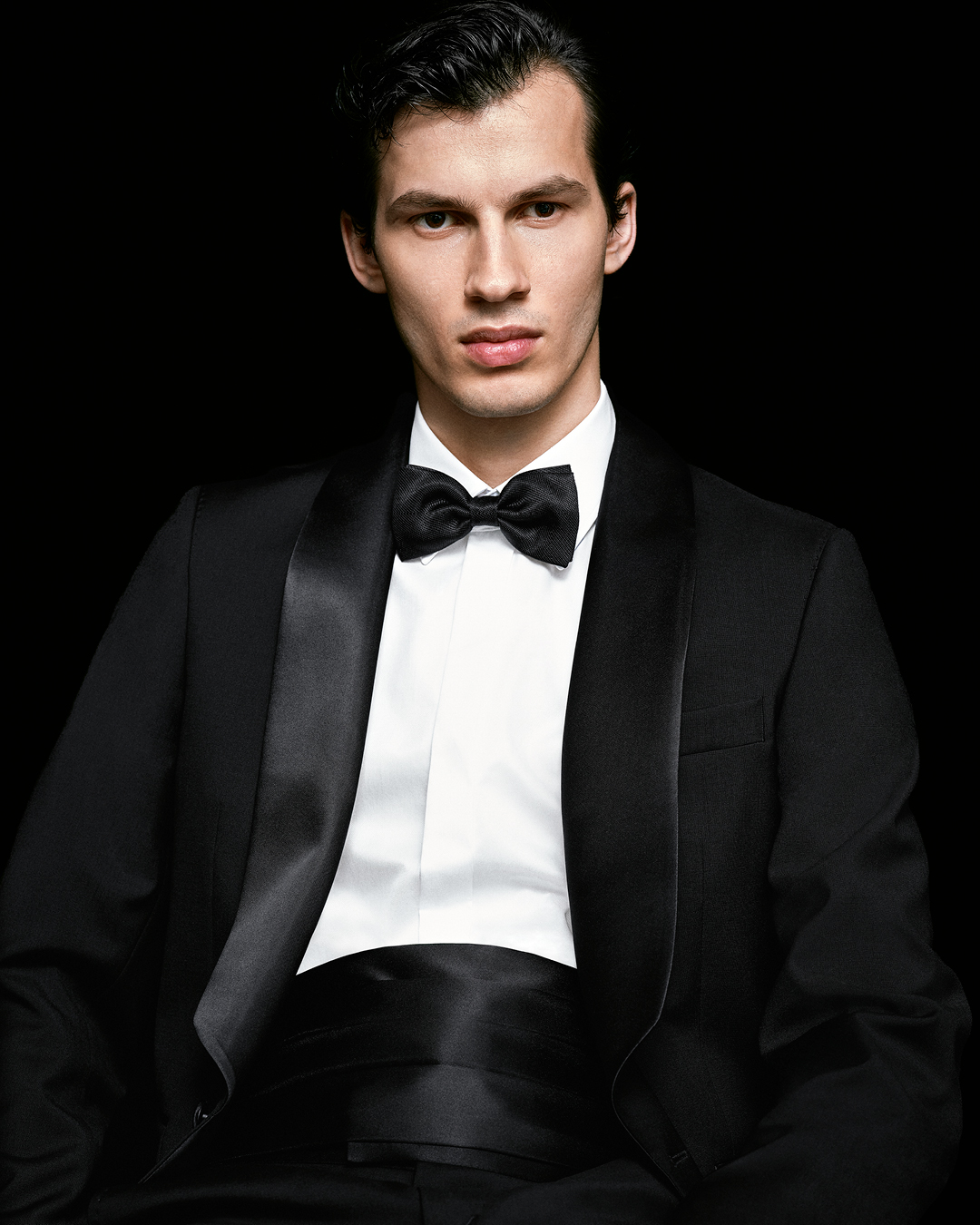 close up of man in tuxedo outfit